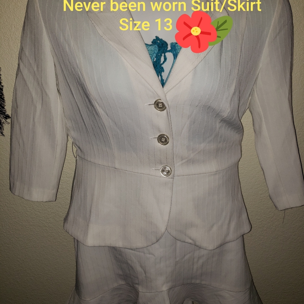 White blazer/with matching skirt